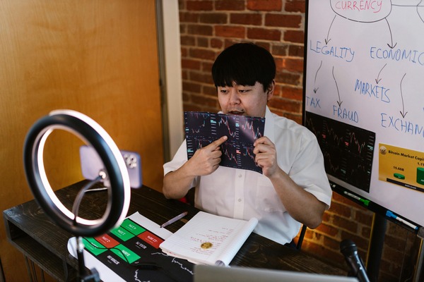 Support specialist working at a desk with a laptop