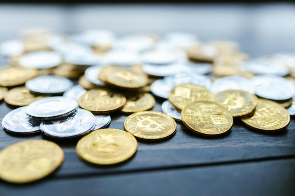 Pile of gold and silver crypto coins