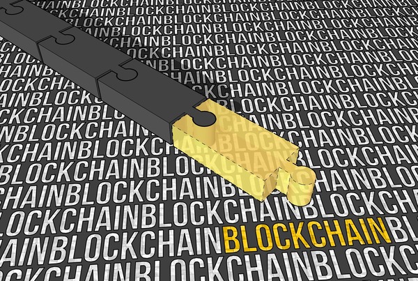 Gold puzzle piece on a background of blockchain text